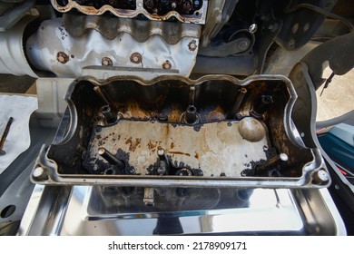 Inspection Of The Inside Of An Engine Full Of Sludge