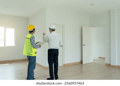 inspector engineer and owner project is inspecting construction and quality assurance new house. Engineers or architects or contactor work to build the house before handing it over to the homeowner
