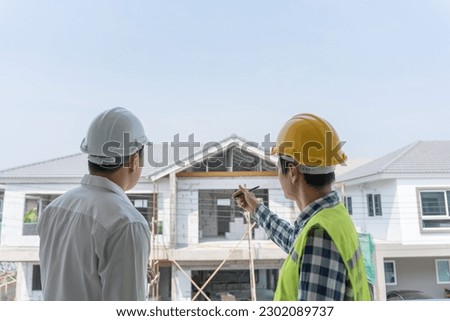 inspector engineer and owner project is inspecting construction and quality assurance new house. Engineers or architects or contactor work to build the house before handing it over to the homeowner
