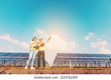 Inspector engineering concept; Engineer inspect solar panel  at solar power plant  - Shutterstock ID 2219762399