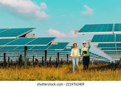 Inspector engineering concept; Engineer inspect solar panel  at solar power plant  - Shutterstock ID 2219762409