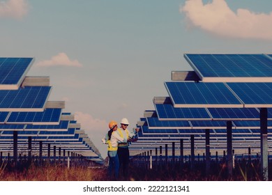 Inspector engineering concept; Engineer inspect solar panel  at solar power plant  - Shutterstock ID 2222121341