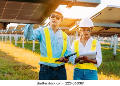 Inspector engineering concept; Engineer inspect solar panel  at solar power plant  - Shutterstock ID 2224566089