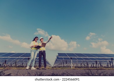 Inspector engineering concept; Engineer inspect solar panel  at solar power plant  - Shutterstock ID 2224566091