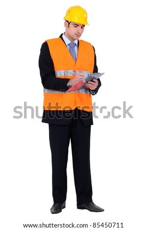 An inspector inspecting a building site