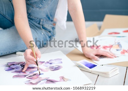 inspiration art creation. painting hobby. woman drawing beautiful floral watercolor design