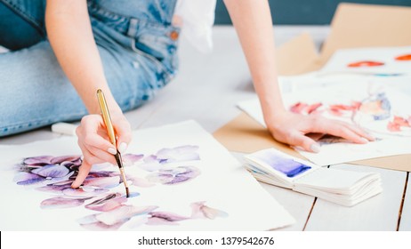 Inspiration And Art Talent. Painting Hobby. Woman Painting Beautiful Floral Artwork. Creative Design.