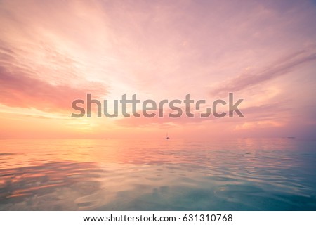 Inspirational calm sea with sunset sky. Meditation ocean and sky background. Colorful horizon over the water
