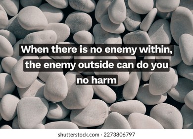 Inspirational life quote on blurry background. When there is no enemy within, the enemy outside can do you no harm.