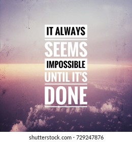 Inspirational motivating quote on background, "it always seems impossible until it's done" - Shutterstock ID 729247876