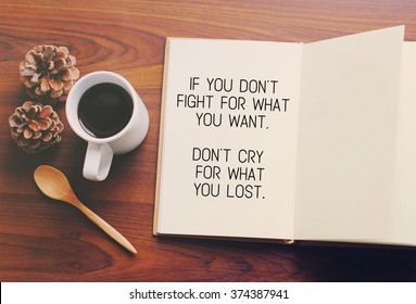 Inspirational motivating quote on notebook and coffee - Shutterstock ID 374387941