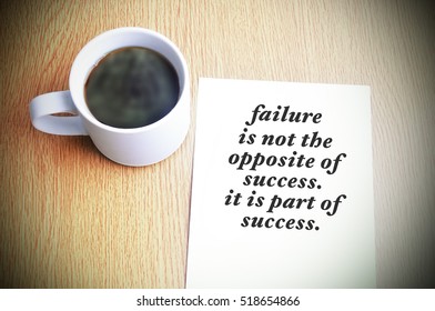 Inspirational motivating quote on paper with black coffee on the table. Failure is not the opposite of success. it is part of success. - Shutterstock ID 518654866