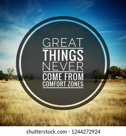 Inspirational motivating quotes "Great things never comes from comfort zone" on blurry motivational background.