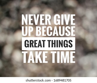 Inspirational motivation quote on abstract background. Never give up because great things take time