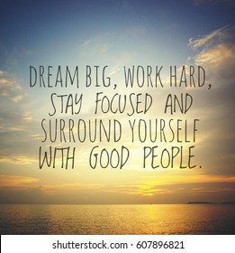 Inspirational motivation quote on sunrise seascape  background. "Dream big, work hard, stay focused and surround yourself with good people". - Shutterstock ID 607896821