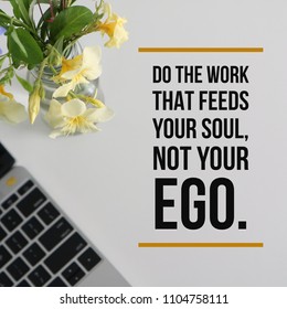 Inspirational motivational quote "Do the work that feeds your soul, not your ego" on laptop with flowers vase background.