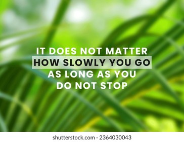 Inspirational and motivational quote with sky background and text "It does not matter how slowly you go as long as you do not stop". - Shutterstock ID 2364030043