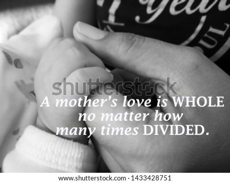 Inspirational quote- a mothers love is whole. No matter how many times divided. With blurry image of a fragile little baby new born hand and fingers holds by her his mother hand in black and white.