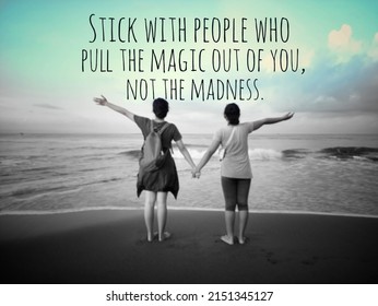 Inspirational Quote - Stick With People Who Pull The Magic Out Of You, Not The Madness. With Two Young Woman Holding Hands, Arm Raised Against The Sea. Positive Life.