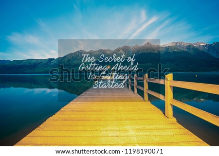 Inspirational success quotes on the mountain sunset background. The secret of getting ahead is getting started