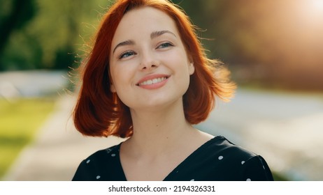 Inspired Redhead Female Model Woman Attractive Girl Caucasian Young Lady Inhaling Fresh Air Make Deep Breath Enjoying Of Blowing Spring Breeze Looking At Bright Sun Shining Background Fix Hair