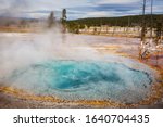 Inspiring natural background. Pools and  geysers  fields  in Yellowstone National Park, USA.