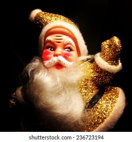 Instagram filtered image of a vintage 1950 gold sparkly Santa Claus 