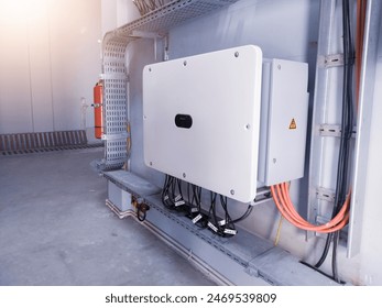 Instalation control of inverters solar panel on the wall. Technology of solar energy with shiny light.