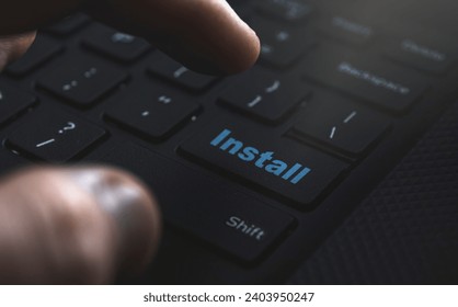 Install button on keyboard. Concept for installing applications on computer. High quality photo