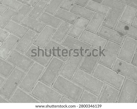 install paving blocks with a fishbone pattern