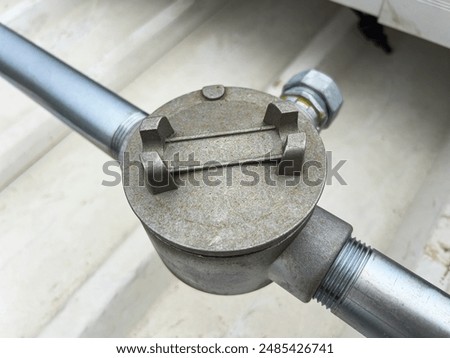 Install a three-way service box for electrical conduit pipes.
