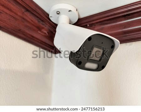 Installation CCTV cameras on the ceiling inside the building.