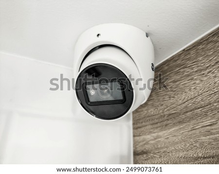 Installation CCTV cameras on the ceiling inside the building.