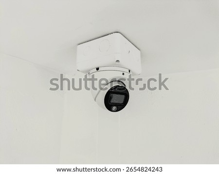 Installation of CCTV cameras on the ceiling inside the building.