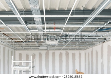 The installation of the ceiling structure, C-light frame for the ceiling starts after the completion of electrical and plumbing work for installation, construction progress,