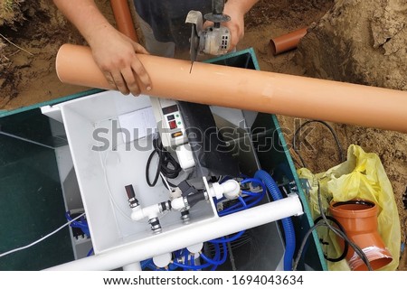 Installation and connection of the sump to the mains.