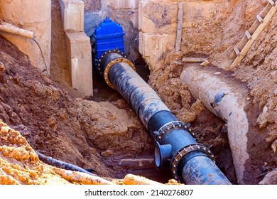 Installation Of The Distribution Unit Of Heating And Water Supply Network. Frame For Connecting Pipes In The Trench Of Ground