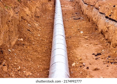 Installation Of The Distribution Unit Of Heating And Water Supply Network. Frame For Connecting Pipes In The Trench Of Ground