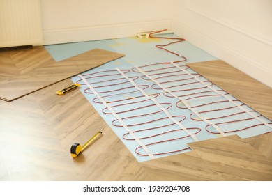 Installation Of Electric Underfloor Heating System Indoors