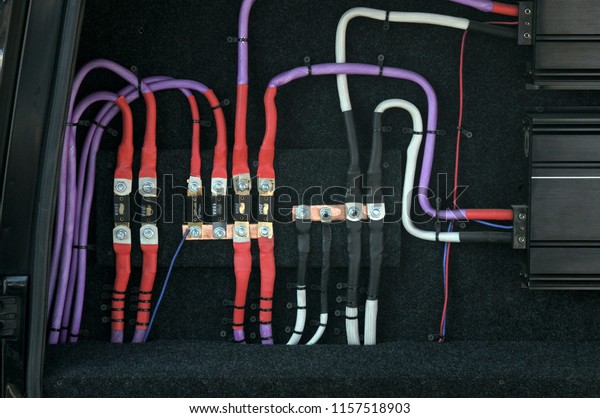 installation of\
electrical cables in car audio\
system
