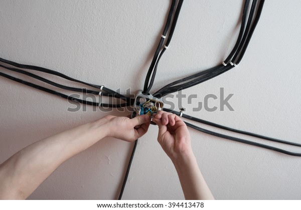 Installation Electrical Junction Box On Ceiling Stock Photo