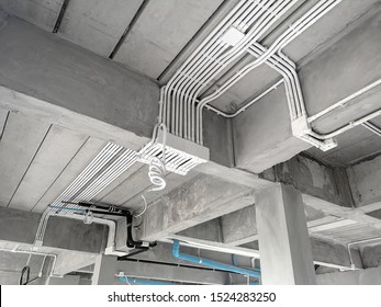 Installation of electrical wiring on the ceiling.Electrical cable system installation.