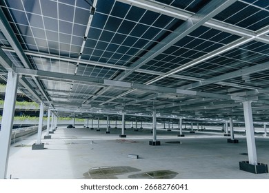 Installation fixed Solar panel support stand column metal frame under Photovoltaic solar cell at rooftop office building Clean power electricity system underneath professional engineering construction
