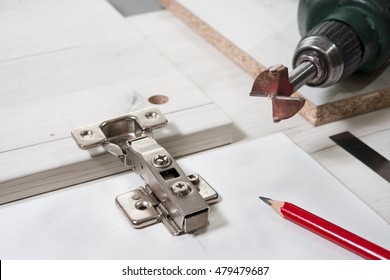 Installation Of Furniture Hinges On The Cabinet Door