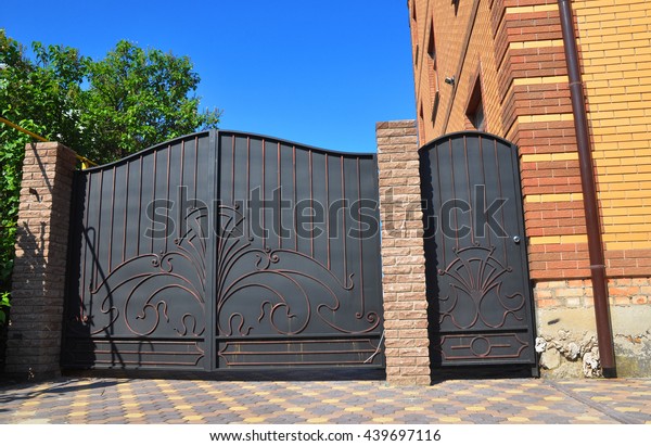 Installation\
of Metal Fence with Door and Gate for\
Car.