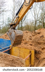 Installation Of Metal Supports To Protect The Walls Of The Trench. The Lining Protects The Walls From Collapsing And Save The Workers.