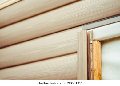 Installation On Facade Of The House Panels Beige Vinyl Siding