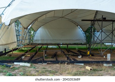 Installation Of Plywood Floors Inside A Large Event Tent