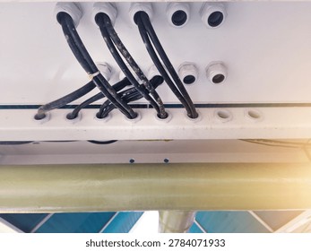 Installation of power input output panel cables through cable glands