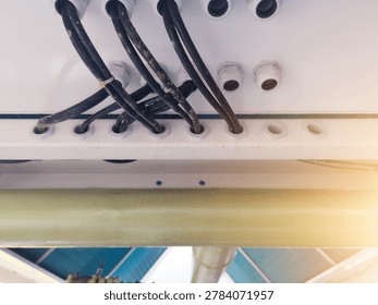 Installation of power input output panel cables through cable glands